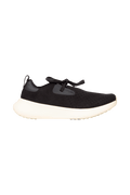 Side view of a Native Shoes Adults Apollo 10 Footwear in Jiffy Black / Tapioca Off White