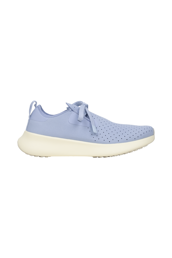 Side view of a Native Shoes Adults Apollo 10 Footwear in Skwybl/Tapoffwht