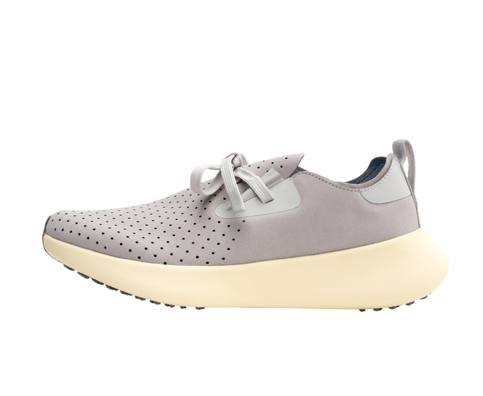 Side view of a Native Shoes Adults Apollo 10 Footwear in Ghost Grey / Tapioca Off White