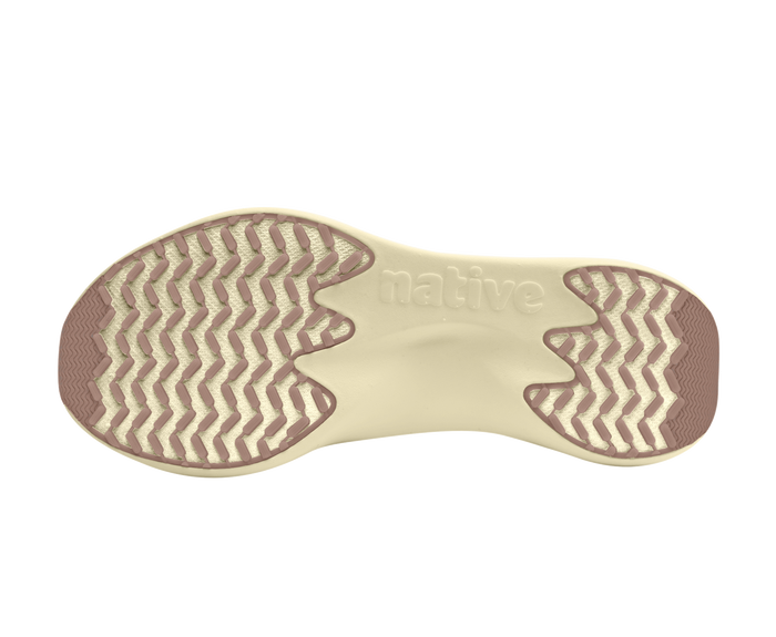 Bottom view of a Native Shoes Apollo 10 | Chameleon Pink / Taos Tan Footwear in Chameleon Pink / Taos Tan