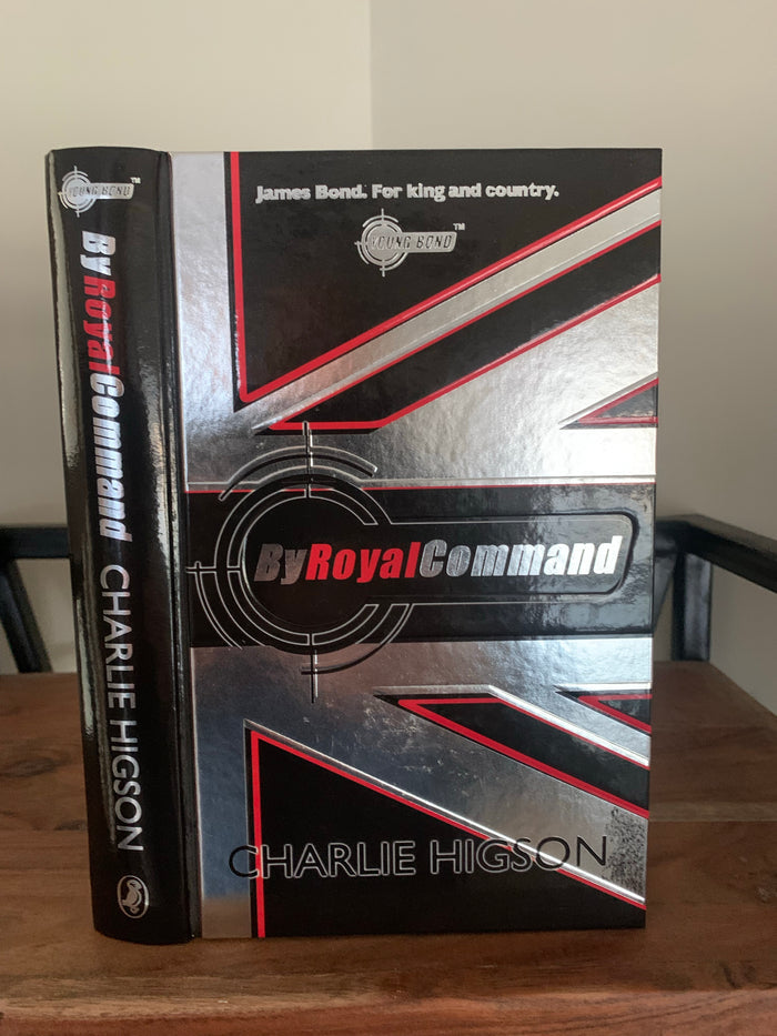 By Royal Command with sprayed red page edges (signed)