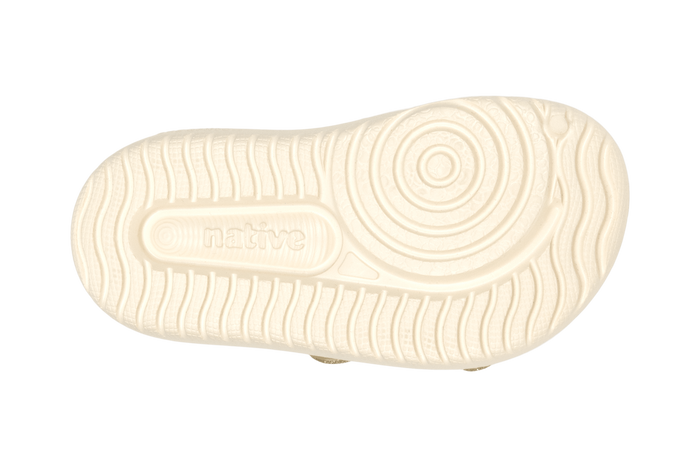 Bottom view of a Native Shoes Kids Chase Bio-Bling Kids | Taos Tan Bling / Bone White Footwear in Taos Tan Bling / Bone White