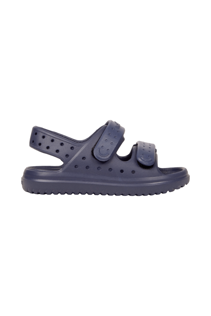 Side view of a Native Shoes Kids Chase Kids Footwear in Regatta Blue / Regatta Blue