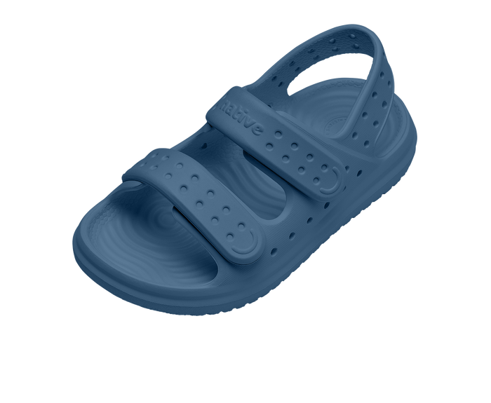 Angled view of a Native Shoes Kids Chase Kids | Oasis Blue / Oasis Blue Footwear in Oasis Blue / Oasis Blue