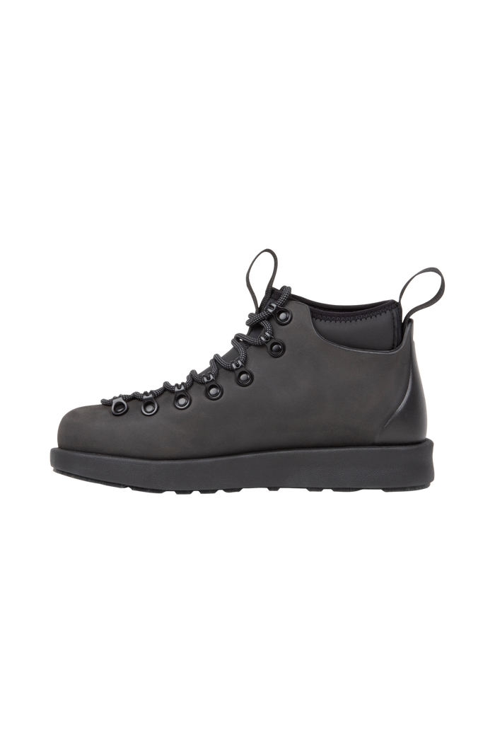 Angled view of a Native Shoes Fitzsimmons Venture | Jiffy Black / Jiffy Black Footwear in Jiffy Black / Jiffy Black