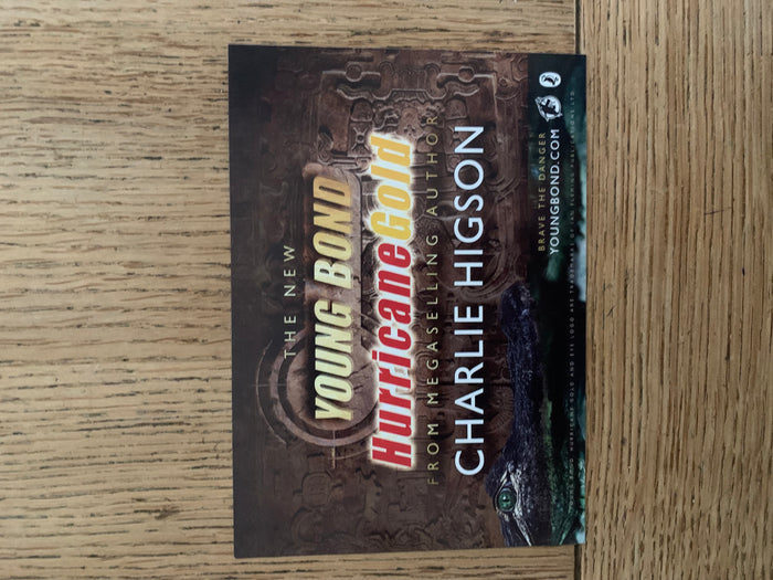 Hurricane Gold with gold sprayed page edges and promotional flyer (signed)