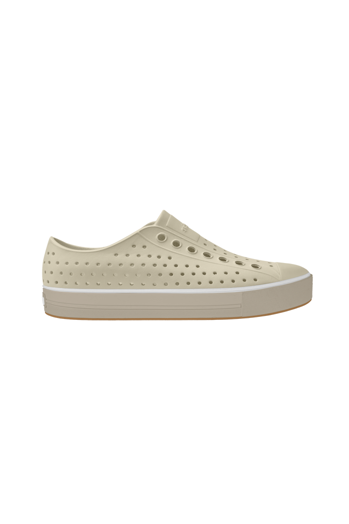 Side view of a Native Shoes Adults Jefferson Arc Wanderfoam Footwear in Bone White / Fog Beige