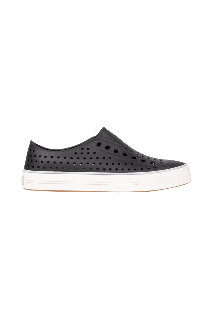 Side view of a Native Shoes Adults Jefferson Arc Wanderfoam Footwear in Jiffy Black / Whisper White