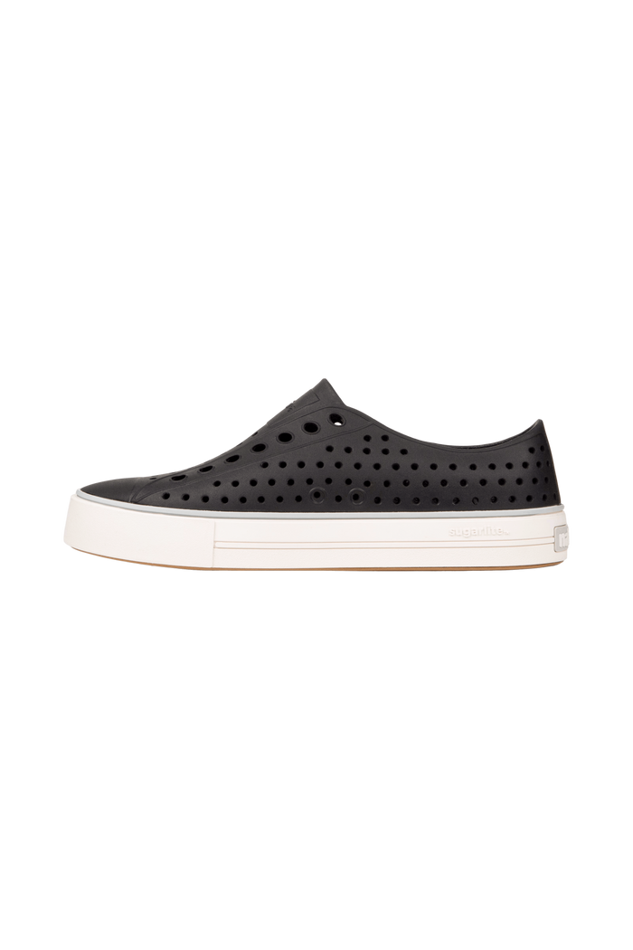 Angled view of a Native Shoes Jefferson Arc Wanderfoam | Jiffy Black / Whisper White Footwear in Jiffy Black / Whisper White