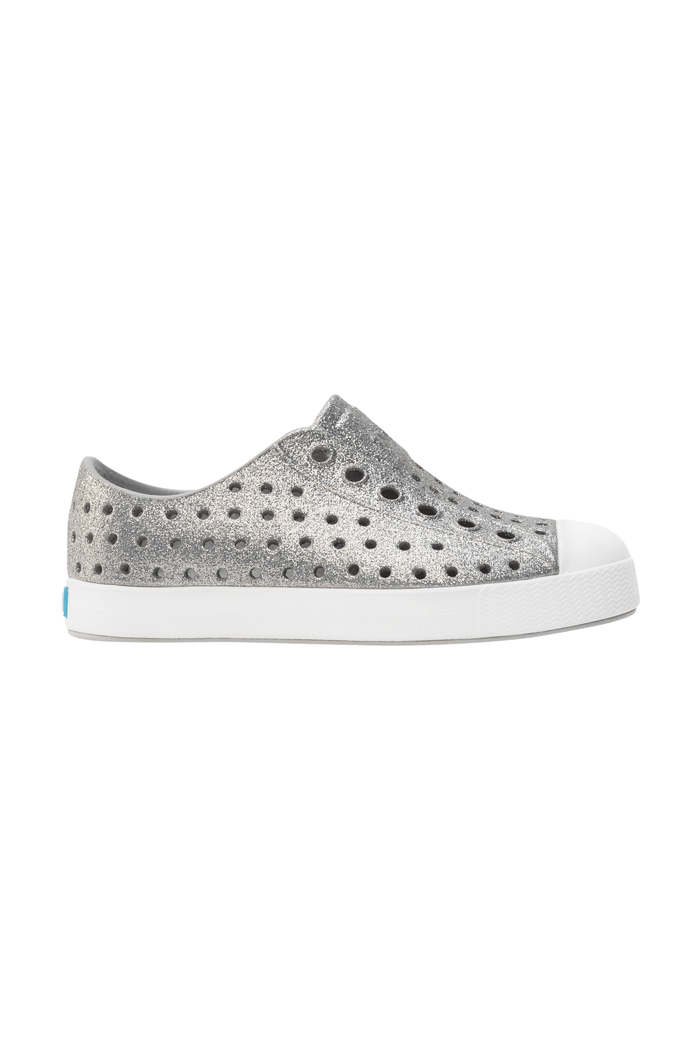 Side view of a Native Shoes Kids Jefferson Bio-Bling Kids Footwear in Platinum Bling / Shell White