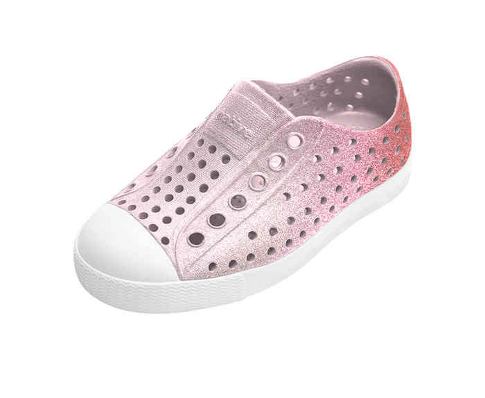 Angled view of a Native Shoes Kids Jefferson Bio-Bling Kids | Barely Samba Bling / Shell White Footwear in Barely Samba Bling / Shell White