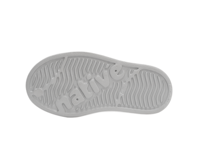 Bottom view of a Native Shoes Kids Jefferson Bio-Bling Kids | Platinum Bling / Shell White Footwear in Platinum Bling / Shell White