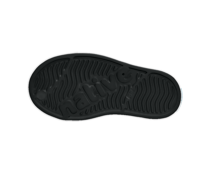 Bottom view of a Native Shoes Kids Jefferson Block Kids | Jiffy Black / Shell White / Peace Alien Block Footwear in Jiffy Black / Shell White / Peace Alien Block