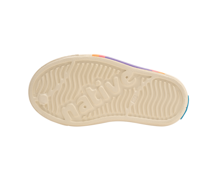 Bottom view of a Native Shoes Kids Jefferson Block Kids | Bone White / Bone White / Apricot Dazzle Ultra Circle Footwear in Bone White / Bone White / Apricot Dazzle Ultra Circle