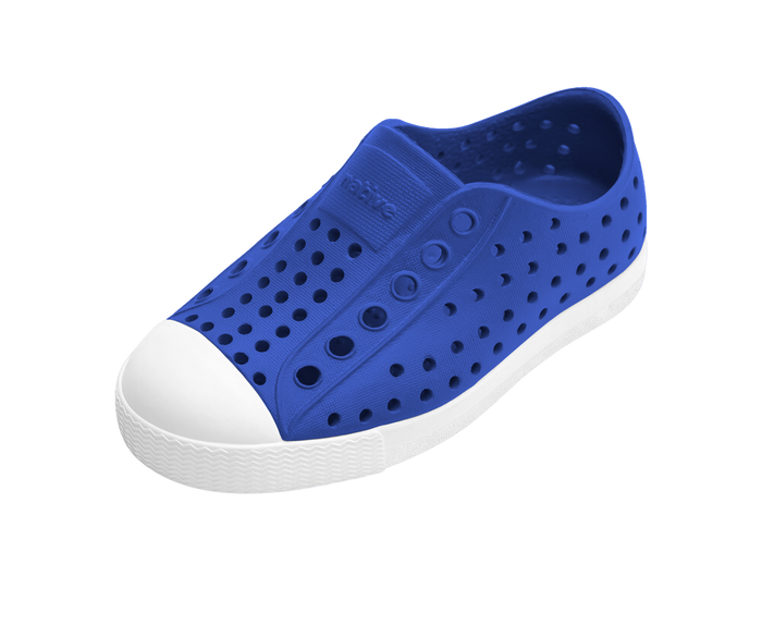 Angled view of a Native Shoes Kids Jefferson Kids | Uv Blue / Shell White Footwear in Uv Blue / Shell White