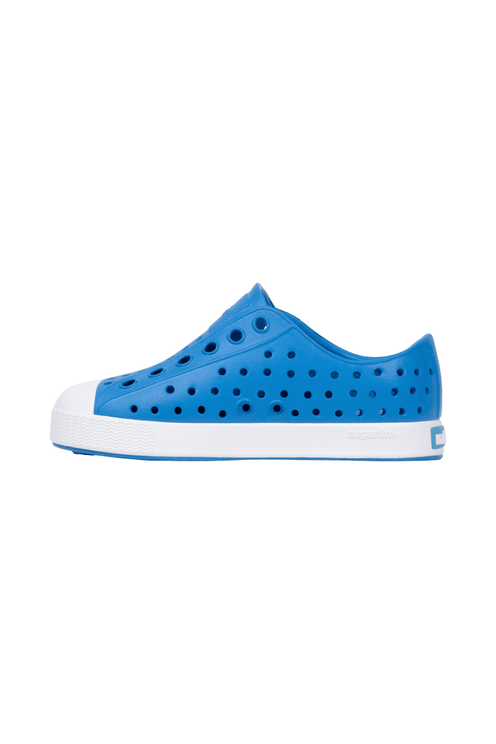 Angled view of a Native Shoes Kids Jefferson Kids | Wave Blue / Shell White Footwear in Wave Blue / Shell White