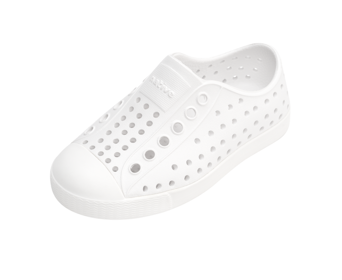 Angled view of a Native Shoes Kids Jefferson Kids | Shell White / Shell White Footwear in Shell White / Shell White