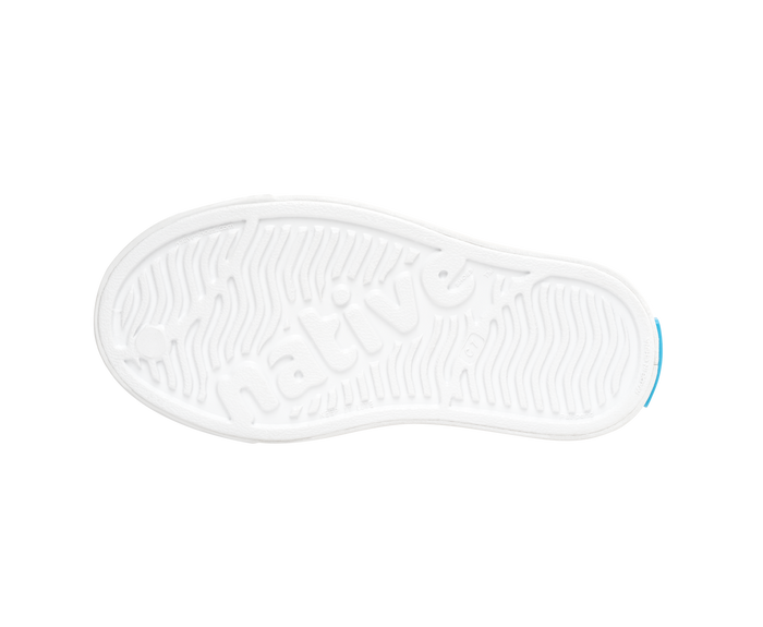 Bottom view of a Native Shoes Kids Jefferson Kids | Shell White / Shell White Footwear in Shell White / Shell White
