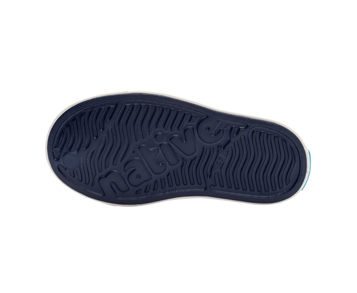 Bottom view of a Native Shoes Kids Jefferson Kids | Regatta Blue / Shell White Footwear in Regatta Blue / Shell White