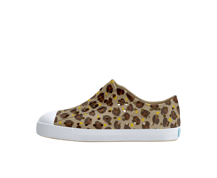Side view of a Native Shoes Kids Jefferson Print Kids Footwear in Flax Tan / Shell White / Freesia Leopard