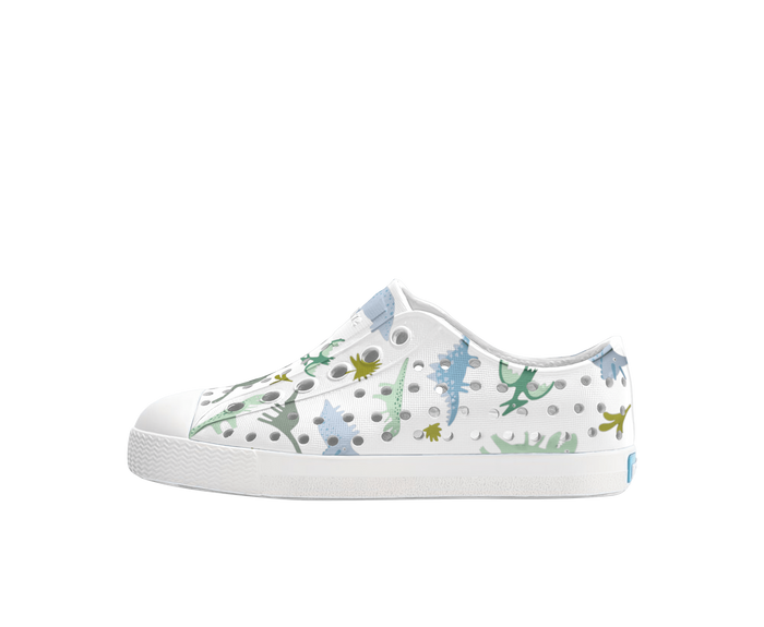Side view of a Native Shoes Kids Jefferson Print Kids Footwear in Shell White / Shell White / Flux Alpine Dino