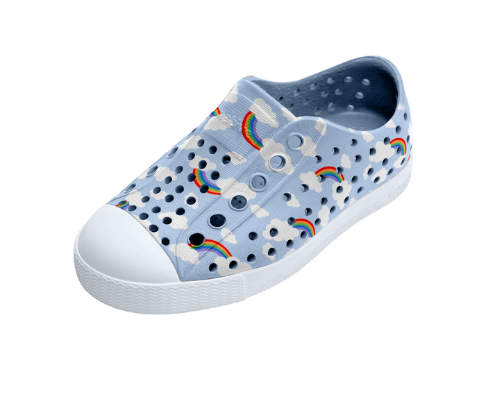Angled view of a Native Shoes Kids Jefferson Print Kids | Skyway Blue / Shell White / Cloud Rainbow Footwear in Skyway Blue / Shell White / Cloud Rainbow