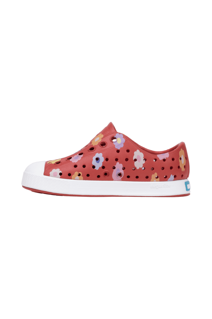 Angled view of a Native Shoes Kids Jefferson Print Kids | Rubyrd/Shlwht/Paradaisy Footwear in Rubyrd/Shlwht/Paradaisy