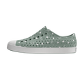 Side view of a Native Shoes Adults Jefferson Wanderfoam Print Footwear in Relax Green / Shell White / Freesia Star Badge