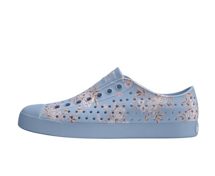 Side view of a Native Shoes Adults Jefferson Wanderfoam Print Footwear in Dawn Blue / Skyway Trans / Floral