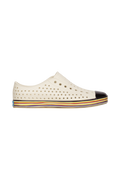 Side view of a Native Shoes Adults Jefferson Wanderfoam Wrp Footwear in Bnwht/Strtarnbw