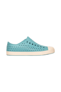 Side view of a Native Shoes Adults Jefferson Footwear in Tktbl/Bnwht