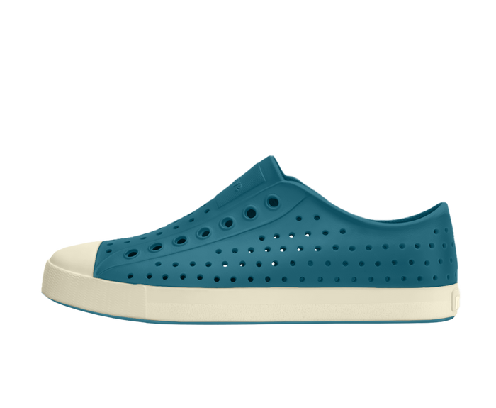 Side view of a Native Shoes Adults Jefferson Footwear in Faded Glory Blue / Bone White