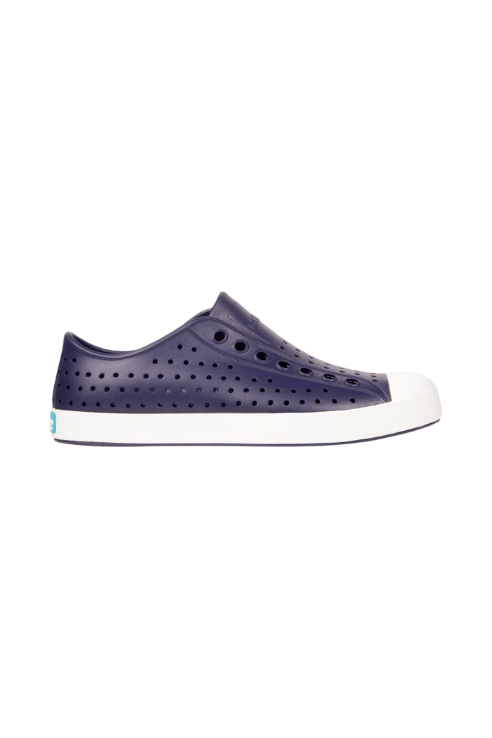 Side view of a Native Shoes Adults Jefferson Footwear in Regatta Blue / Shell White