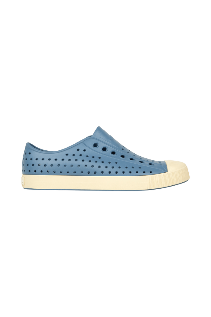 Side view of a Native Shoes Adults Jefferson Footwear in Oasis Blue / Bone White