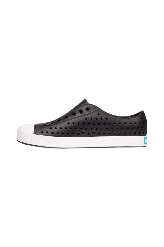 Angled view of a Native Shoes Jefferson | Jiffy Black / Shell White Footwear in Jiffy Black / Shell White