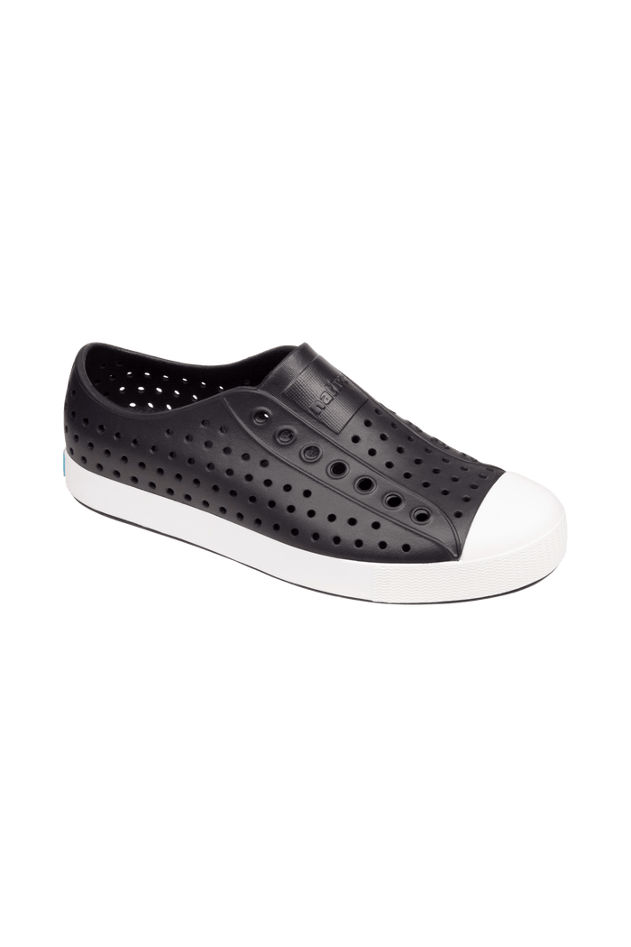 Bottom view of a Native Shoes Jefferson | Jiffy Black / Shell White Footwear in Jiffy Black / Shell White