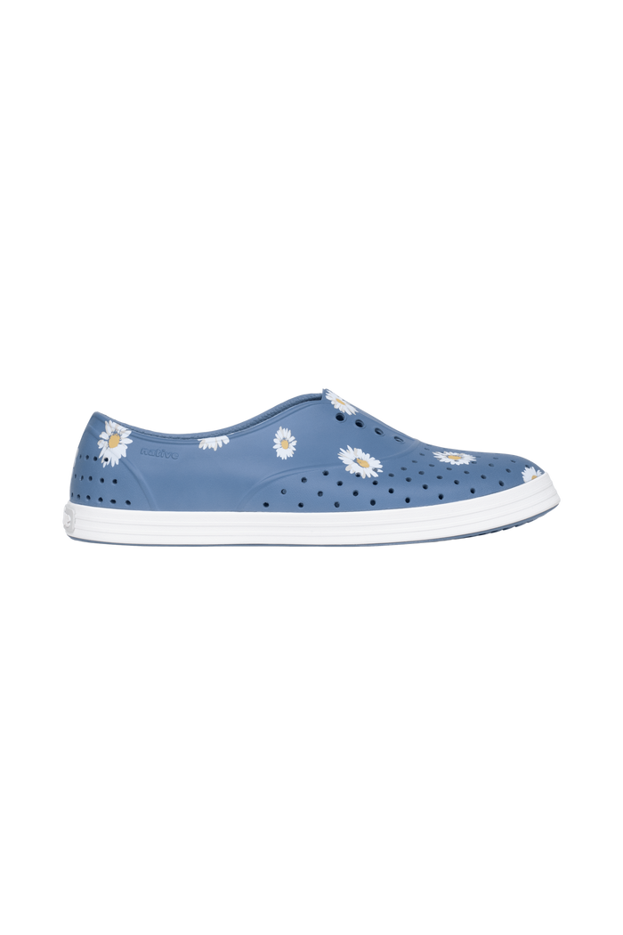 Side view of a Native Shoes Adults Jericho Wanderfoam Print Footwear in Oasisbl/Shlwht/Daisyaop