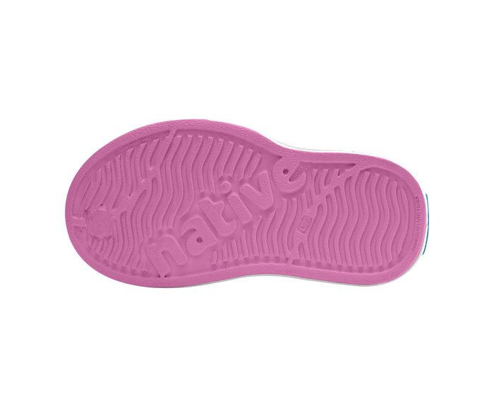 Bottom view of a Native Shoes Kids Miles Block Kids | Malibu Pink / Shell White / Rainbow Block Footwear in Malibu Pink / Shell White / Rainbow Block