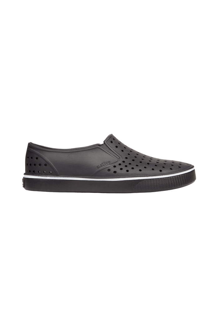 Side view of a Native Shoes Adults Miles Wanderfoam Footwear in Jiffy Black / Jiffy Black