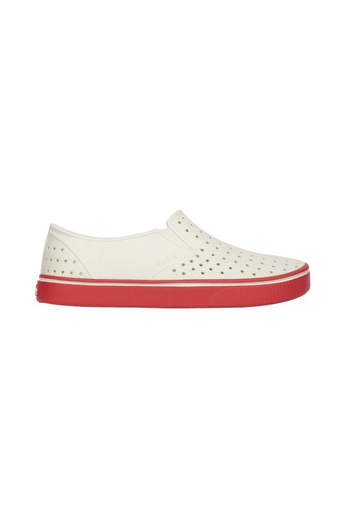 Side view of a Native Shoes Adults Miles Wanderfoam Footwear in Bnwht/Luckrd