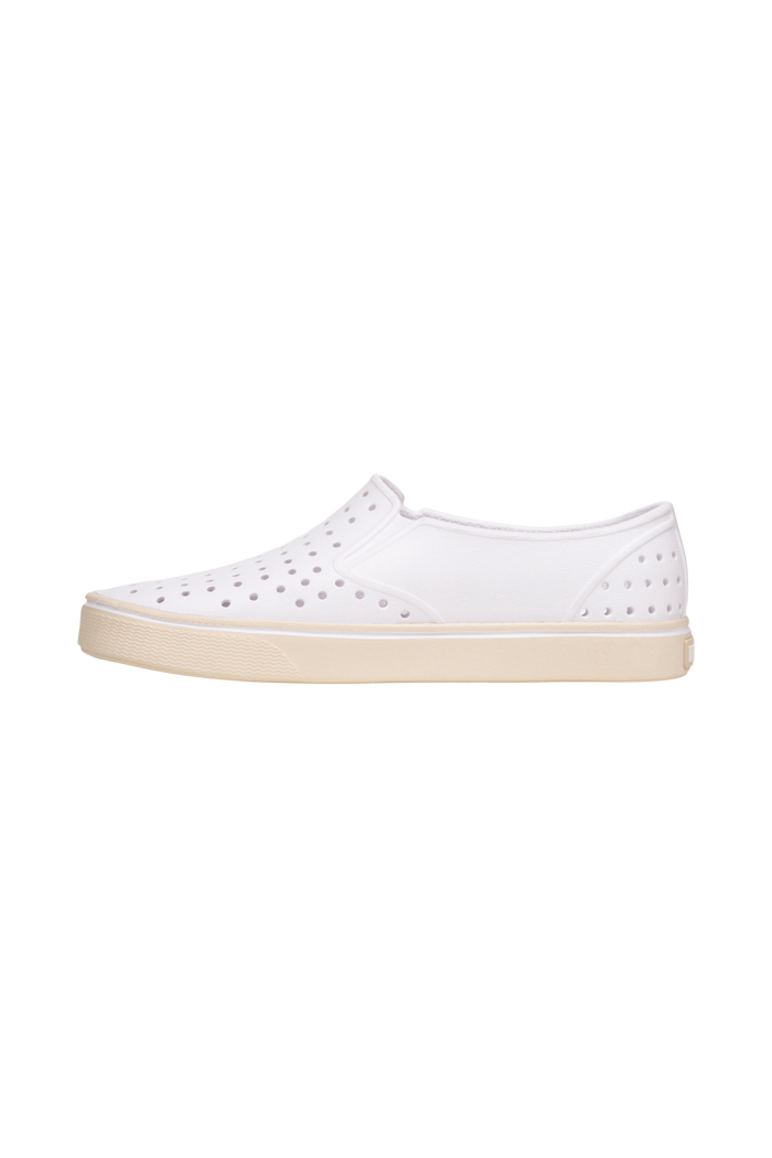 Angled view of a Native Shoes Miles Wanderfoam | Shell White / Bone White Footwear in Shell White / Bone White