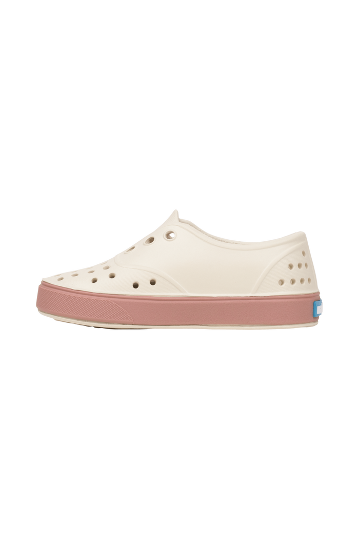 Angled view of a Native Shoes Kids Miller Kids | Bnwht/Caypnk Footwear in Bnwht/Caypnk