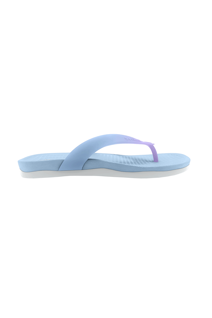Side view of a Native Shoes Adults Paolo Wanderfoam Ombre Footwear in Skyway Blue / Dawn Blue / Twirling Ombre