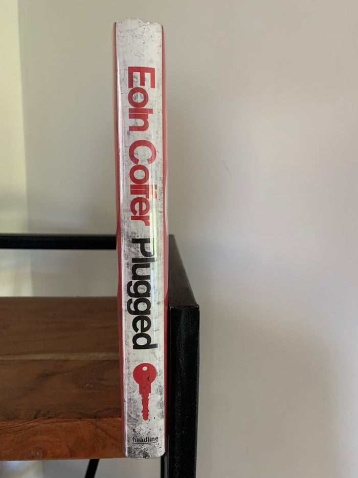 Plugged (signed)