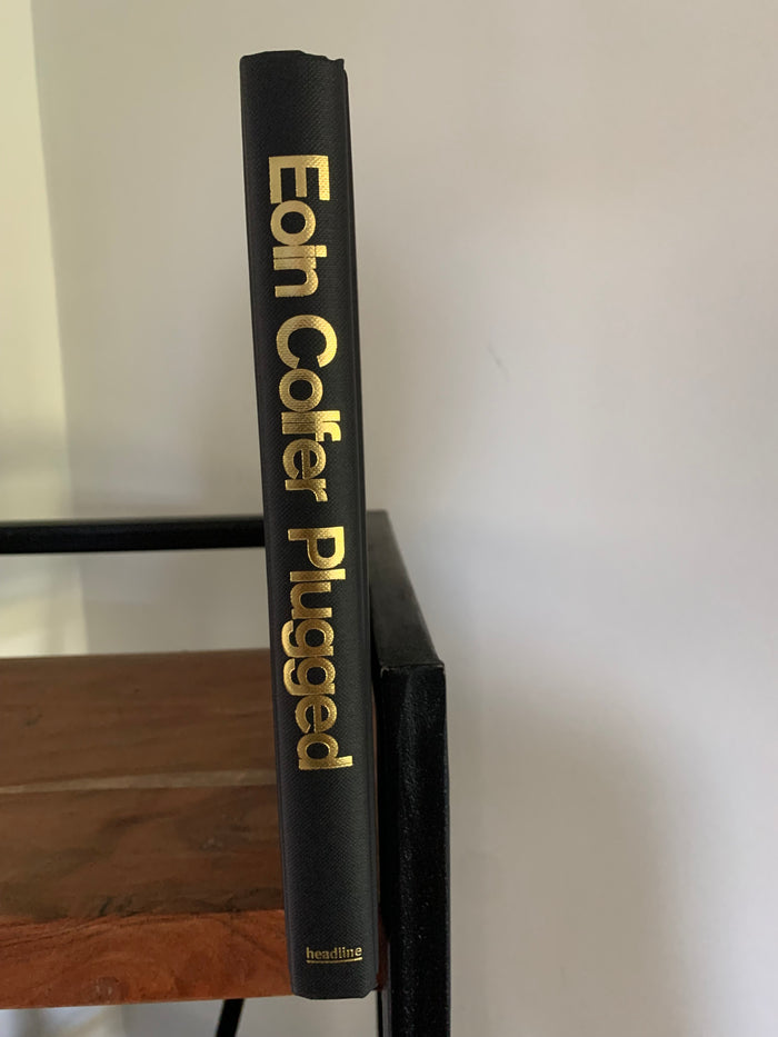 Plugged (signed)