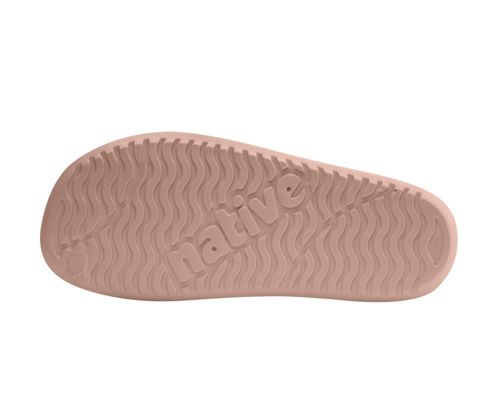 Bottom view of a Native Shoes Spencer Lx Wanderfoam Print | Chameleon Pink / Chameleon Pink / Leopard Footwear in Chameleon Pink / Chameleon Pink / Leopard