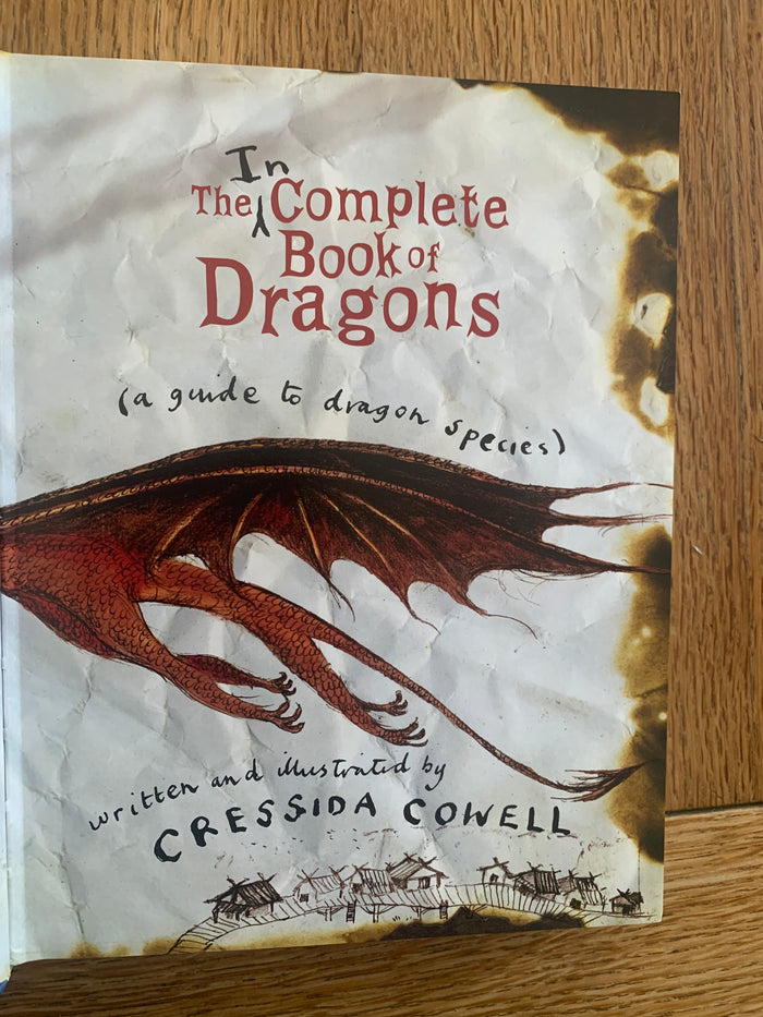 The Incomplete Book of Dragons - a guide to dragon species (signed with large dragon doodle)